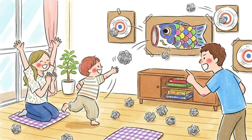 新聞紙ボールで的当てゲームをする家族