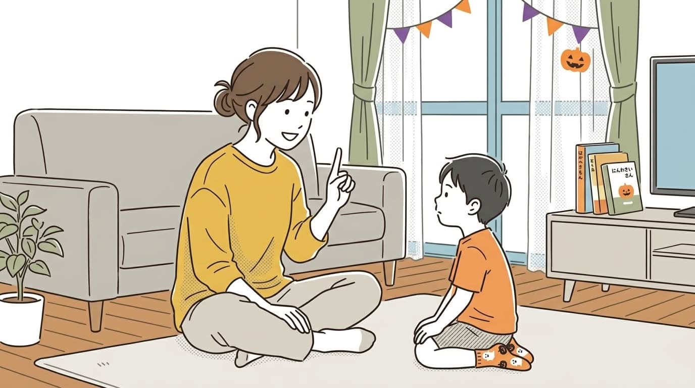 親が男の子に指を使いながらトリックオアトリートの意味をやさしく解説している家庭の様子